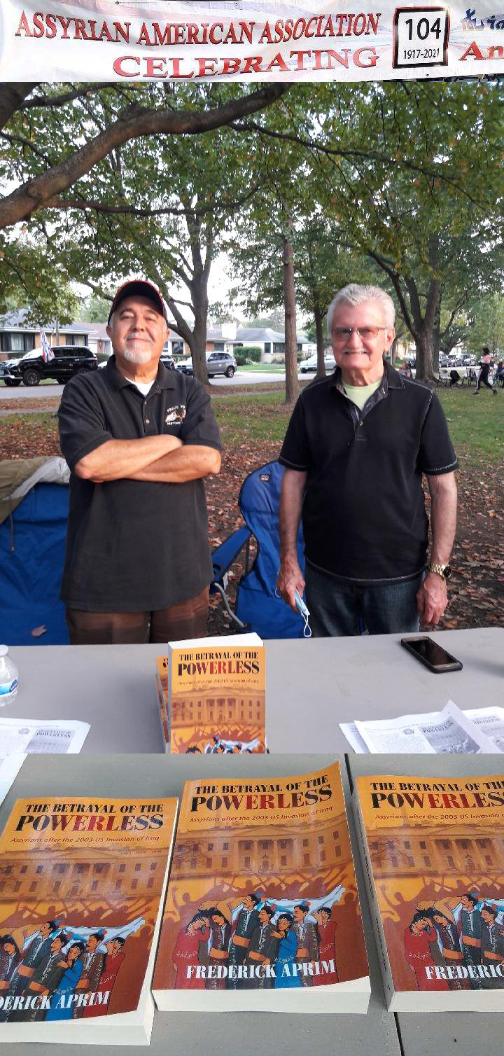 Paul Gewargis and William Aprim at the Assyrian American Association Festival promoting Frederick Aprim's new book on October 10, 2021 in Skokie, Illinois.